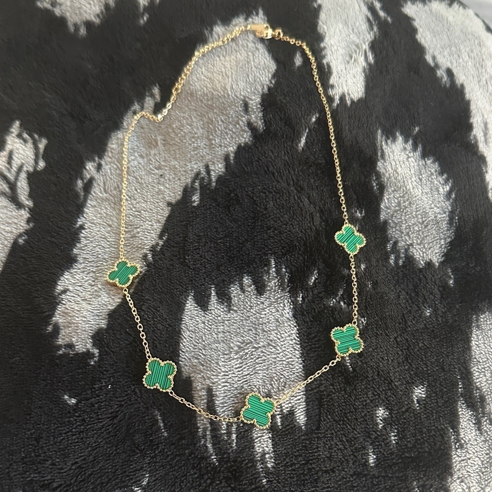Elegant Gold Necklace with Green Clover Charms